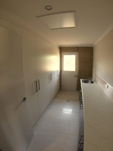 10 Sanderson Rd laundry and storage